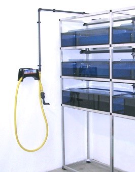 Xenopus rack with water removal station(mounted on the wall beside it)