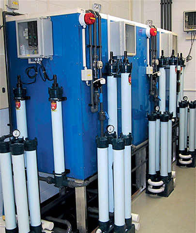 Water treatment facility with UV-lamps and fine filters